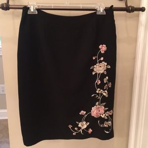 Beautiful black skirt with embroidered flowers